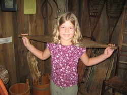 Ella with a yoke like Almanzo might have used to carry water